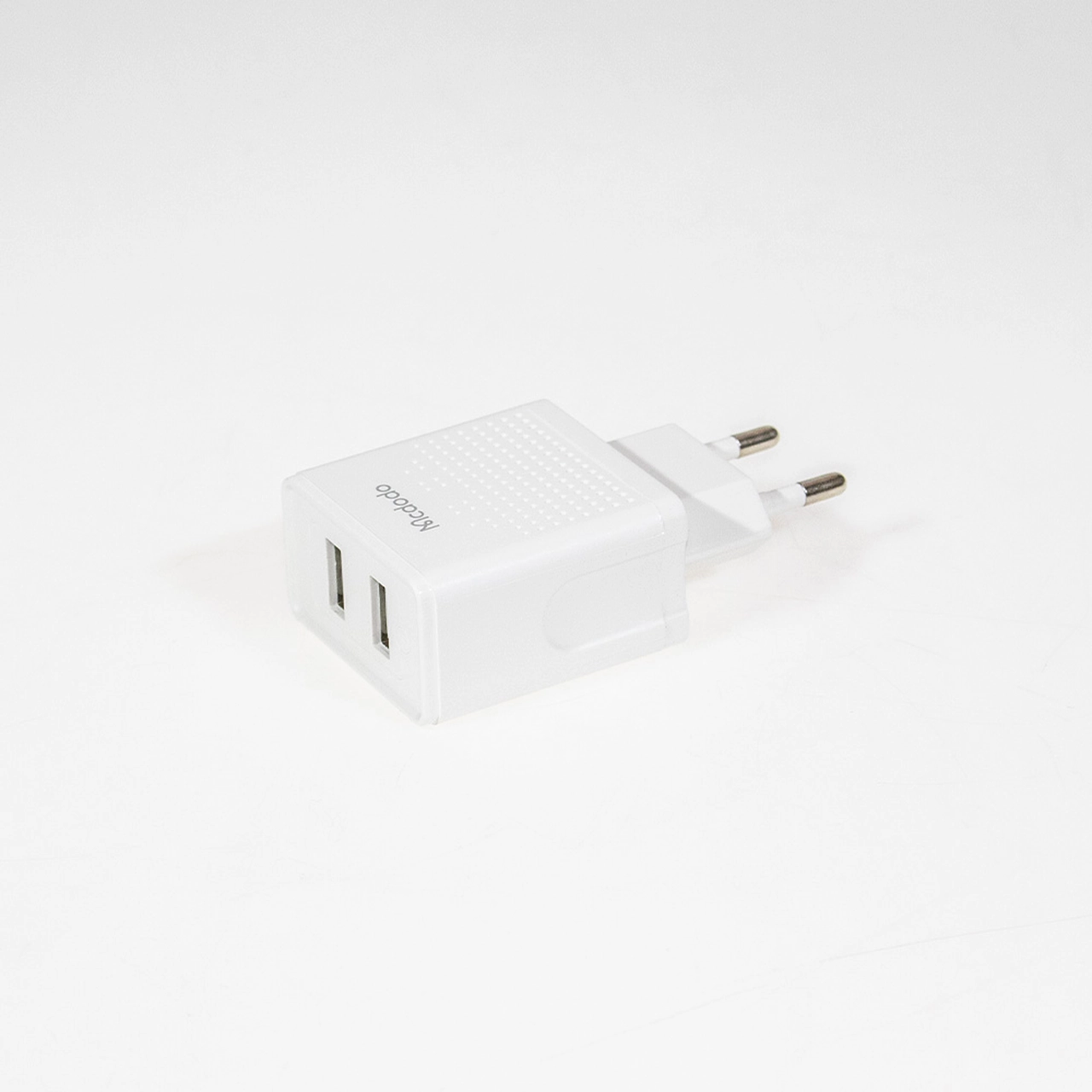 شارژر دیواری فست Mcdodo مدل CH-3972 12 وات دو پورت USB همراه کابل Type-C سفید